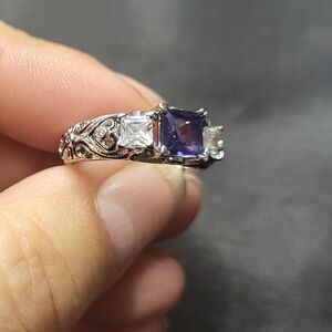 Purple and clear stones ring